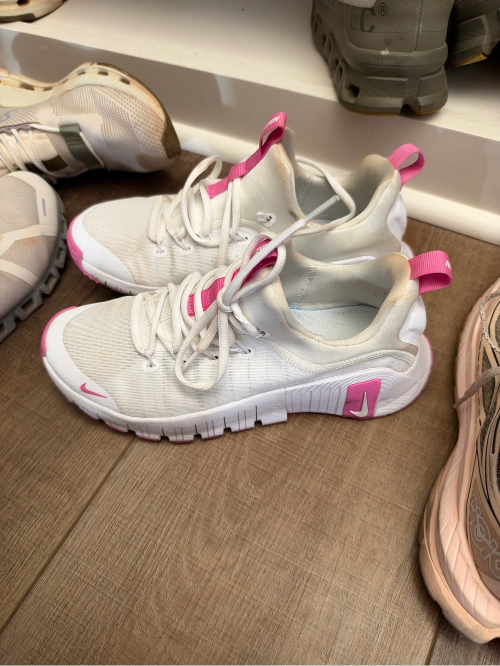Nike Women’s White Sneakers with Pink Accents